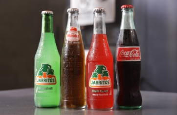 Specialty sodas including Mexican Coca-cola, Jarritos and more