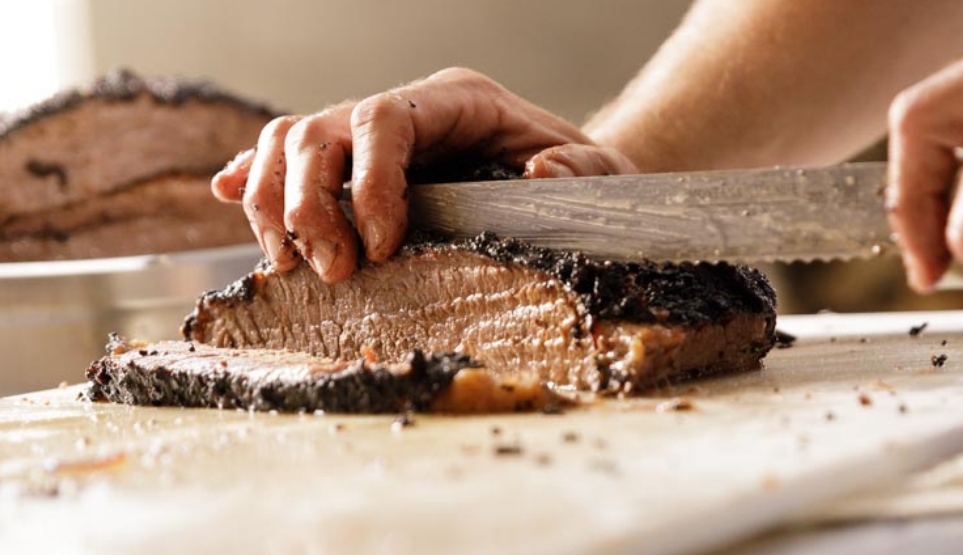 Crossbuck BBQ Texas Style Brisket being sliced to order