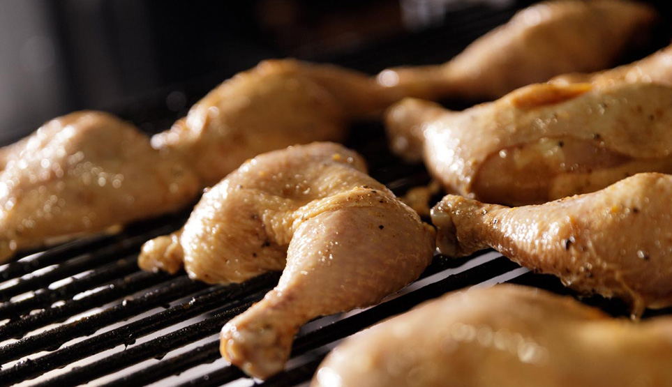 Crossbuck BBQ's soy smoked, dark meat chicken on the smoker